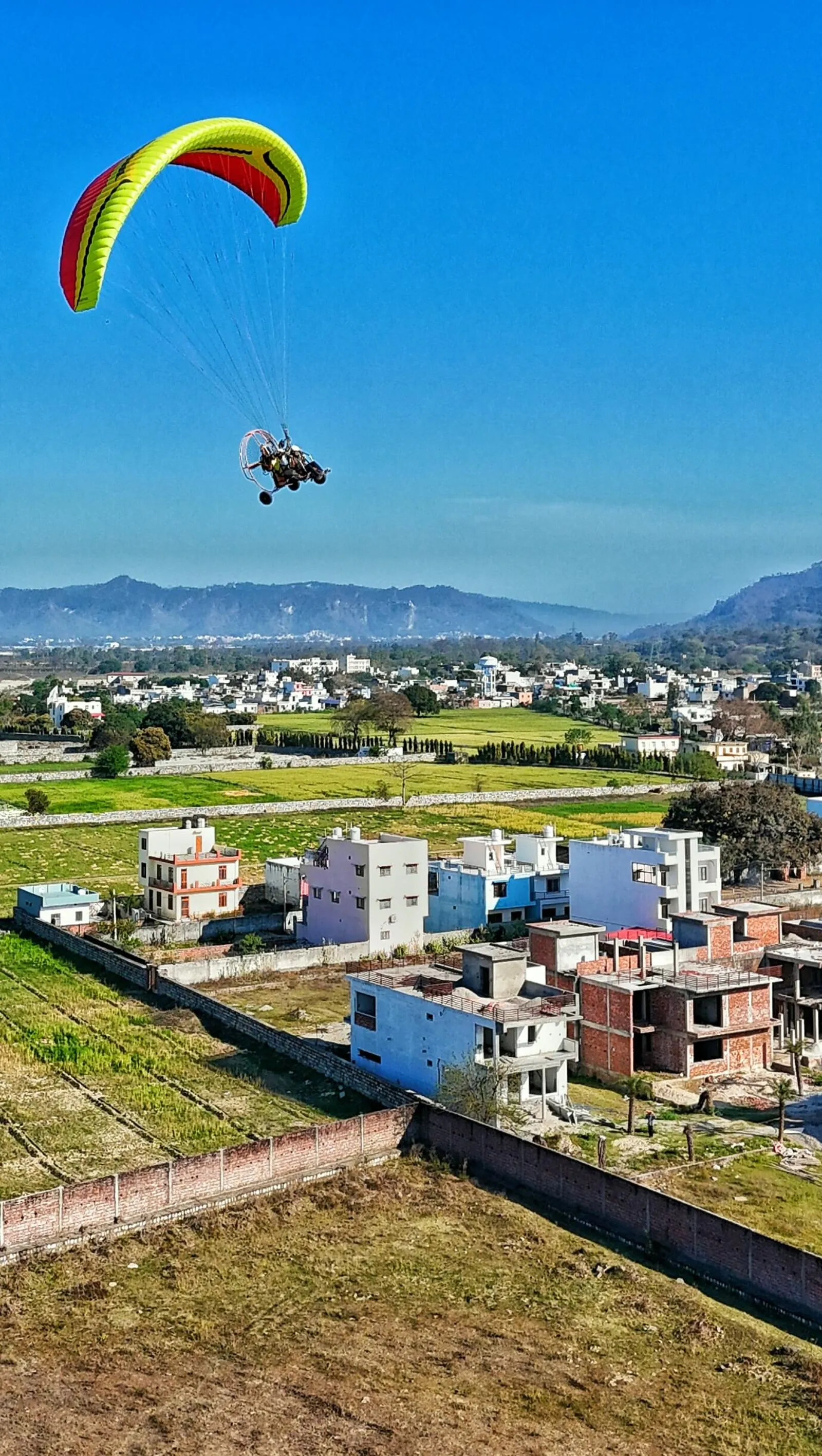 Paragliding over mountains